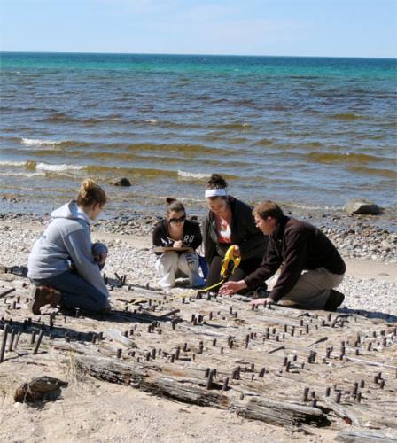 Students examing beach site of Katherine V shipwreck