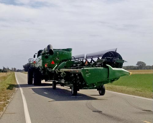 Combine on road