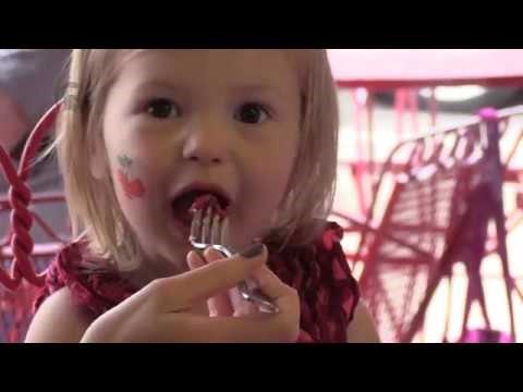 Girl eating cherries
