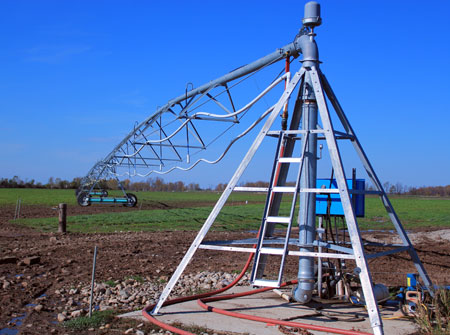 Shupe center pivot irrigator