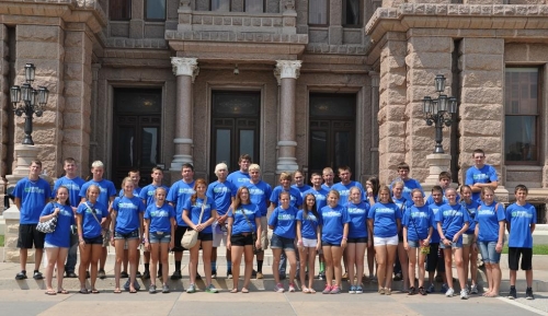 Photo Caption: Members of the Washtenaw County, Michigan and Burleson County, Texas 4-H  Exchange groups stop for a photo in front of the Texas State Capitol. 