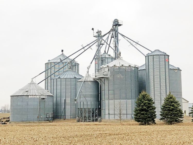 Grain storage bins on a farm.