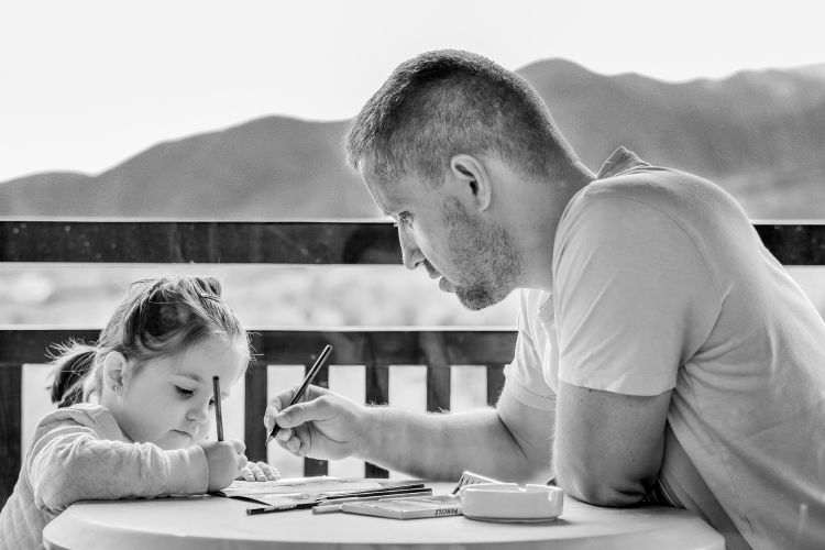 Girl and father coloring