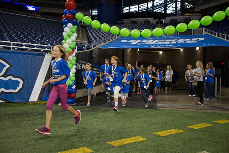 Engaging students in a motivating, energy-packed day full of fun, movement and learning at Ford Field to celebrate a healthy school year with Fuel Up to Play 60.