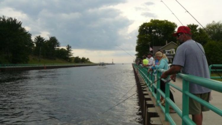 Anglers line up on the Pentwater pier to target the overlooked and under-appreciated freshwater drum.