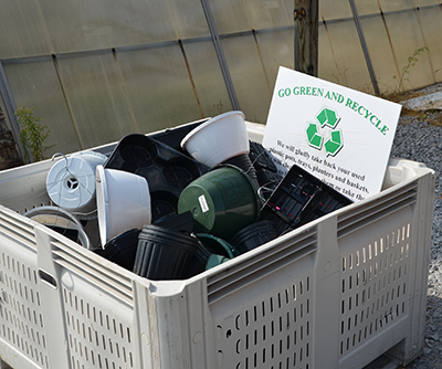 Garden-retail center accepting used containers from consumers.